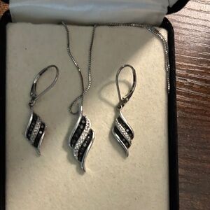 Kay Jewelers white Gold and Black and clear diamond set.